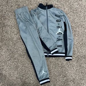 Gray Jordan track suit. Never worn Jordan track suit. Size 7